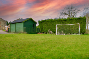 Private lawn and mini football pitch at Habberjam Farm