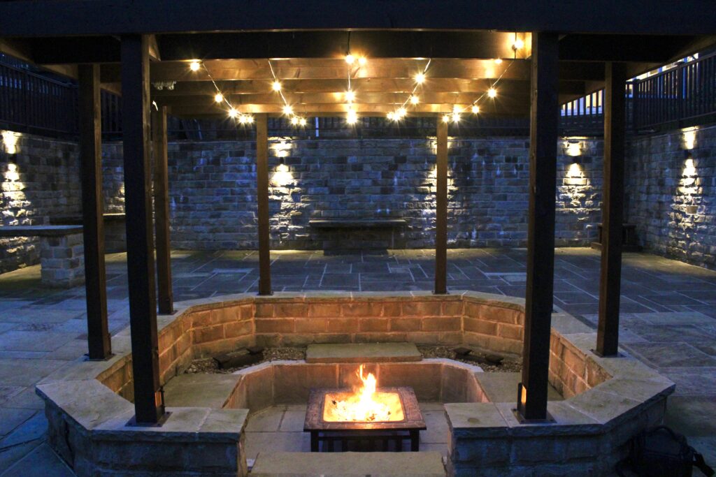 Outdoor fire pit seating area at Habberjam Farm