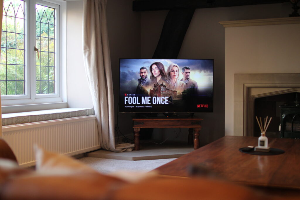 Living room at Habberjam Farm with smart TV and countryside views