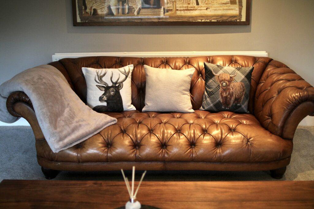 Living room at Habberjam Farm with classic Chesterfield sofa