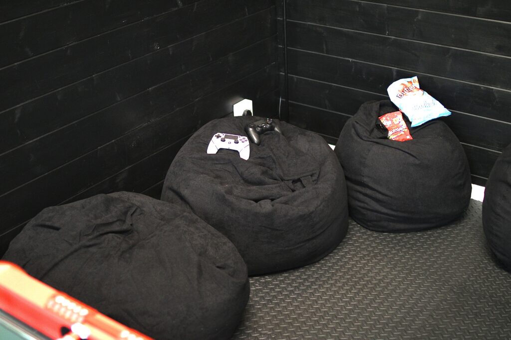 Relaxed comfy seating area inside Habberjam Farm's games room